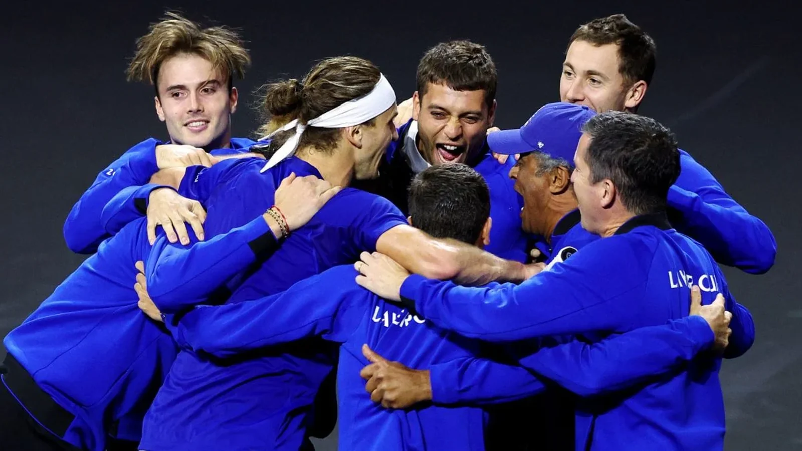 Team Europe players and captain Yannick Noah embrace in a celebratory huddle at the Laver Cup.