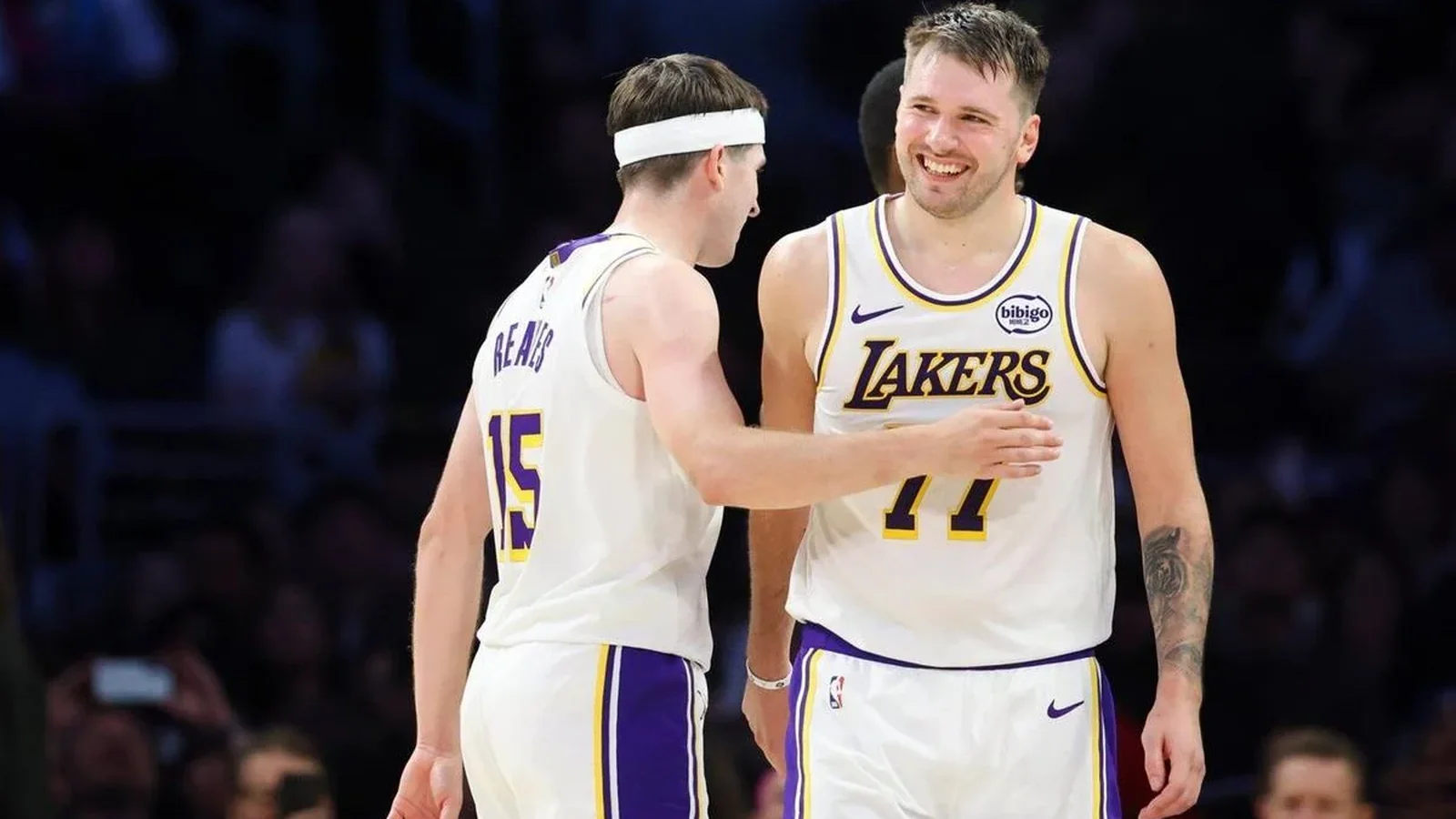 Luka Doncic and Austin Reaves in a Lakers jersey
