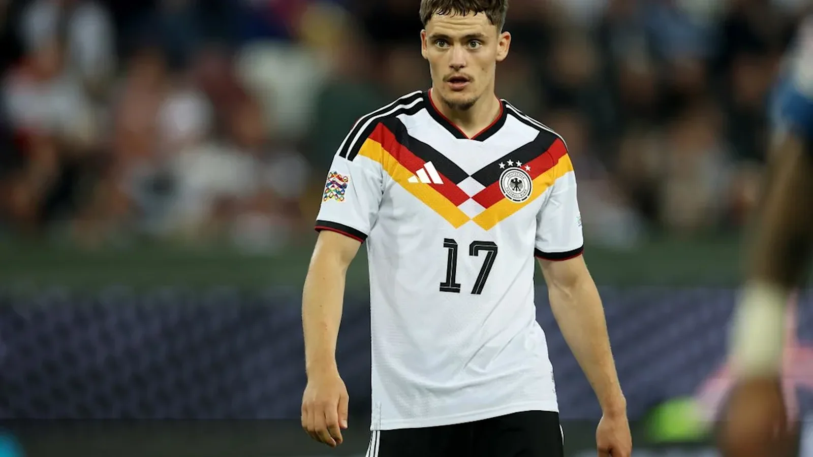Florian Wirtz on the pitch wearing Germany’s white number 17 shirt.