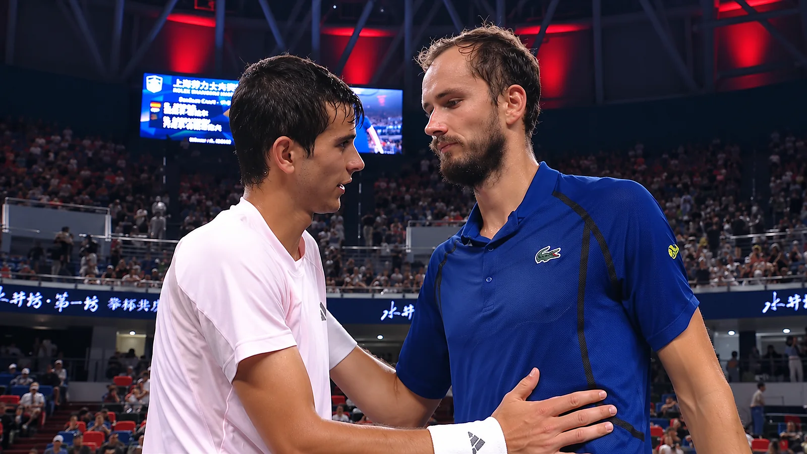 Two tennis players share a post-match sportsmanship moment at the Shanghai Masters.