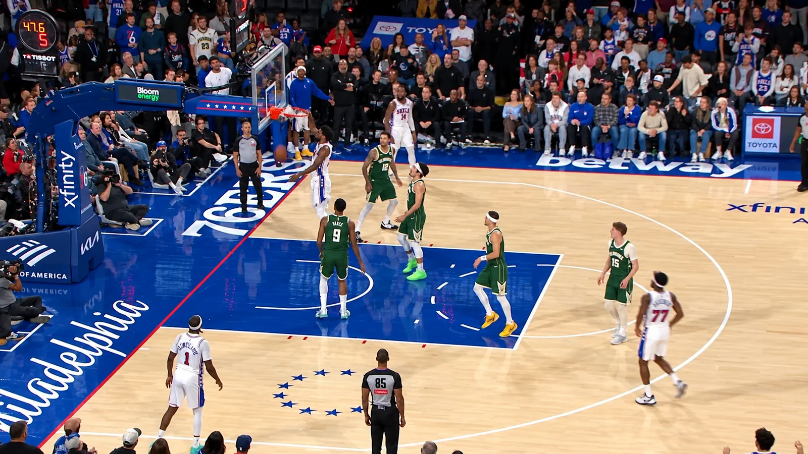 Philadelphia 76ers attack the basket against the Milwaukee Bucks during an NBA game in Philadelphia.