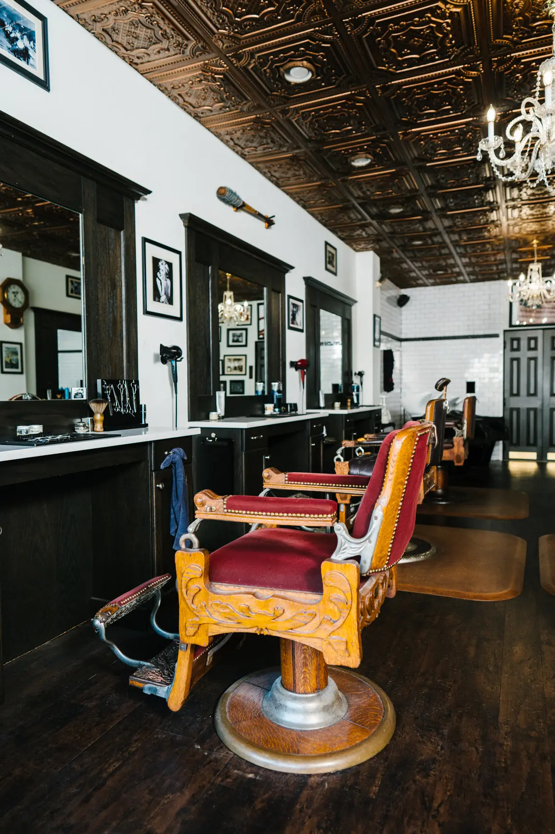 Row of barber chairs on the shop floor at The Stray Hare