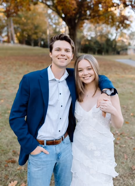 Gavin Gochnour, CFP®, smiling alongside his fiancée as they celebrate their engagement.