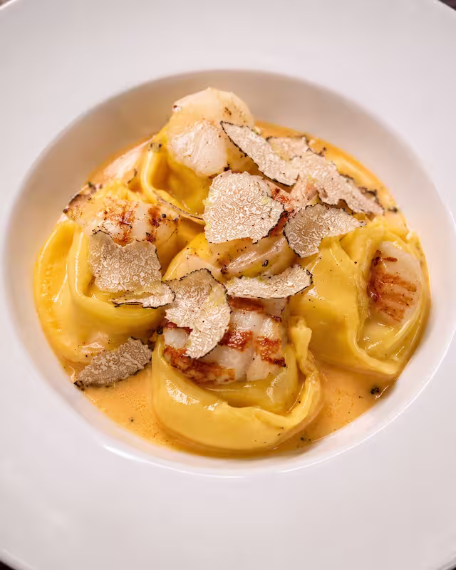 Cappellacci with scallops and shaved truffle