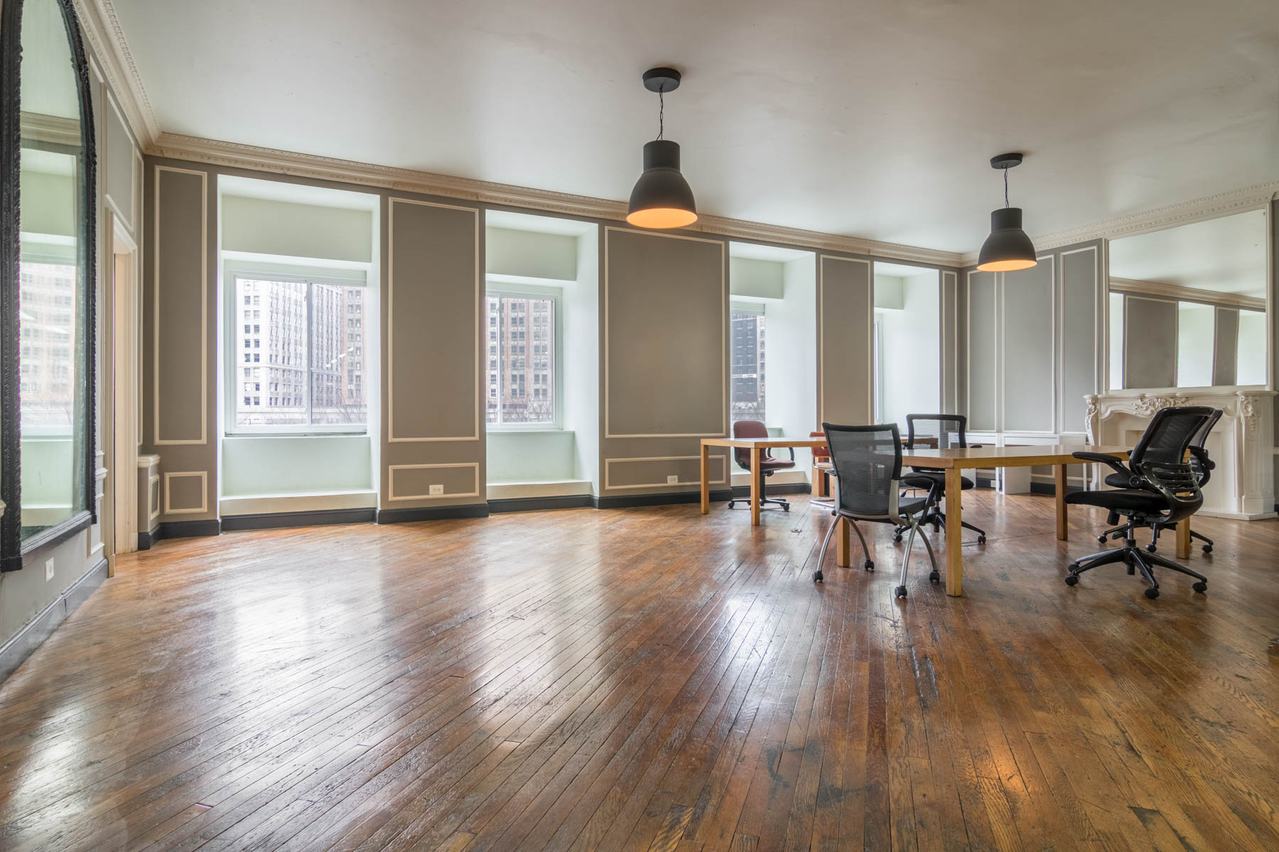 Claridge House open workspace with brick walls