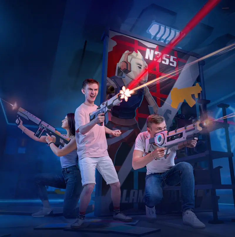 Two players with VR controllers in a co-op game