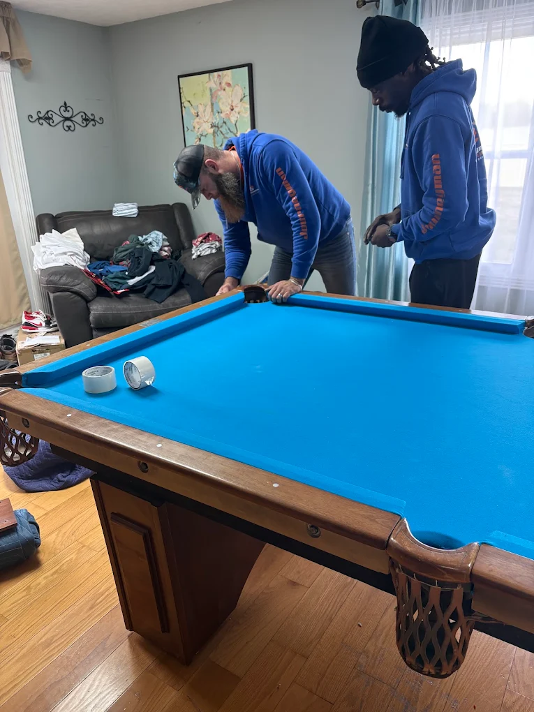 image of moving crew with equipment