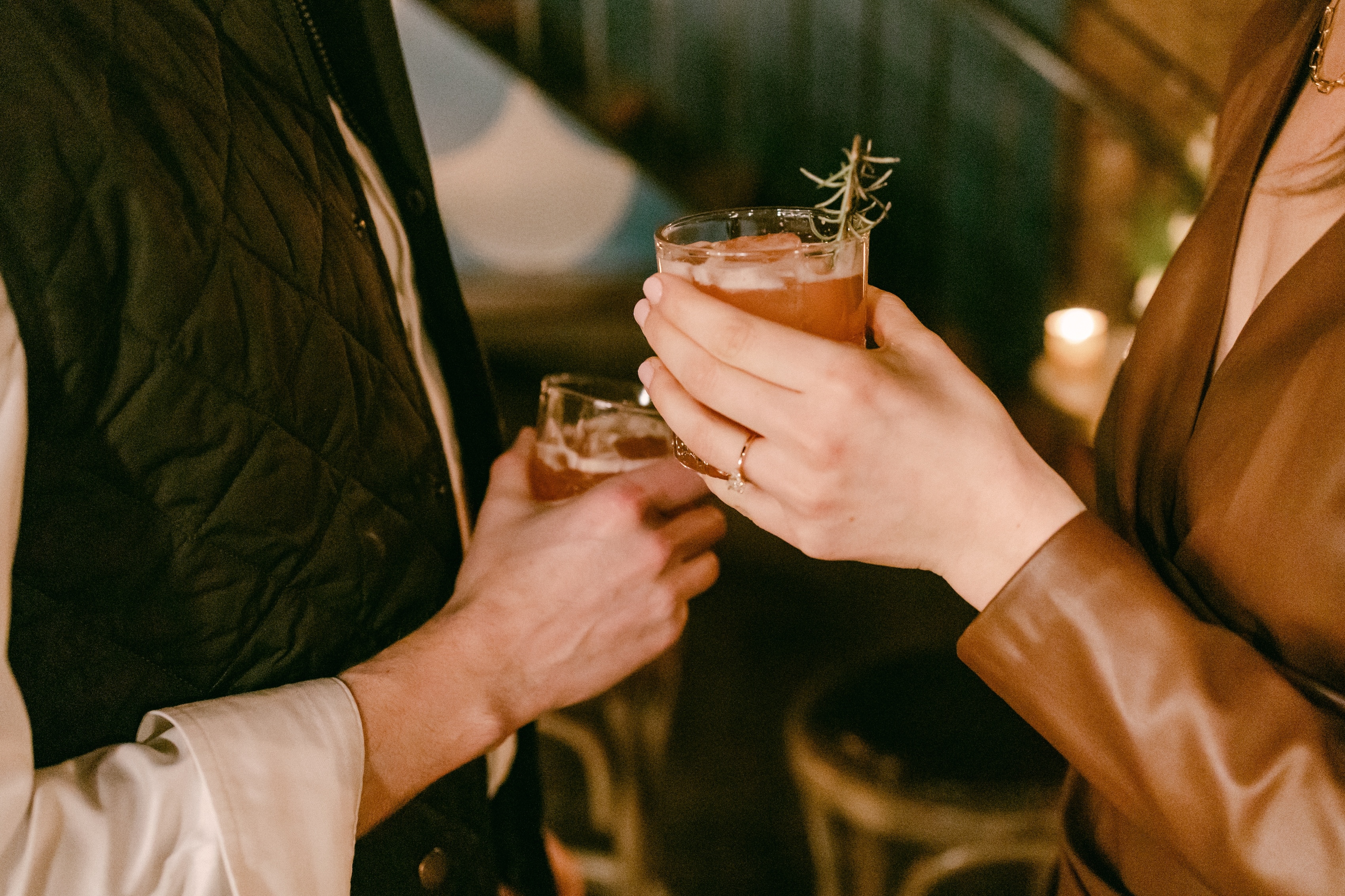 Man and woman with drink in hand stock image