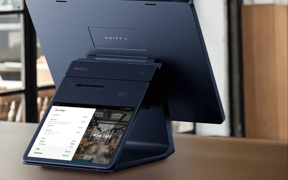 SkyTab POS till with a customer facing display showing the order on a cafe counter