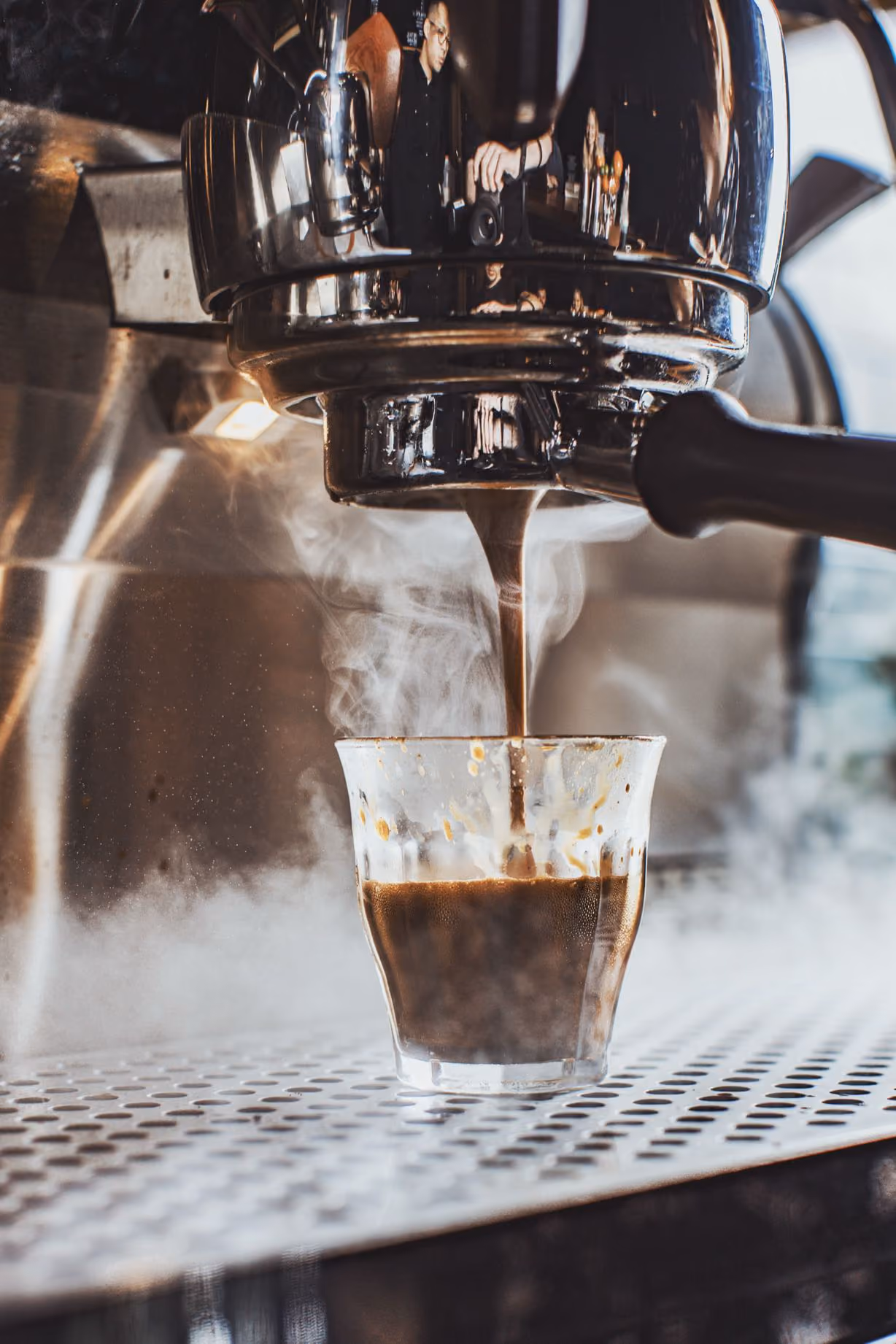 Espresso extracting from a commercial portafilter
