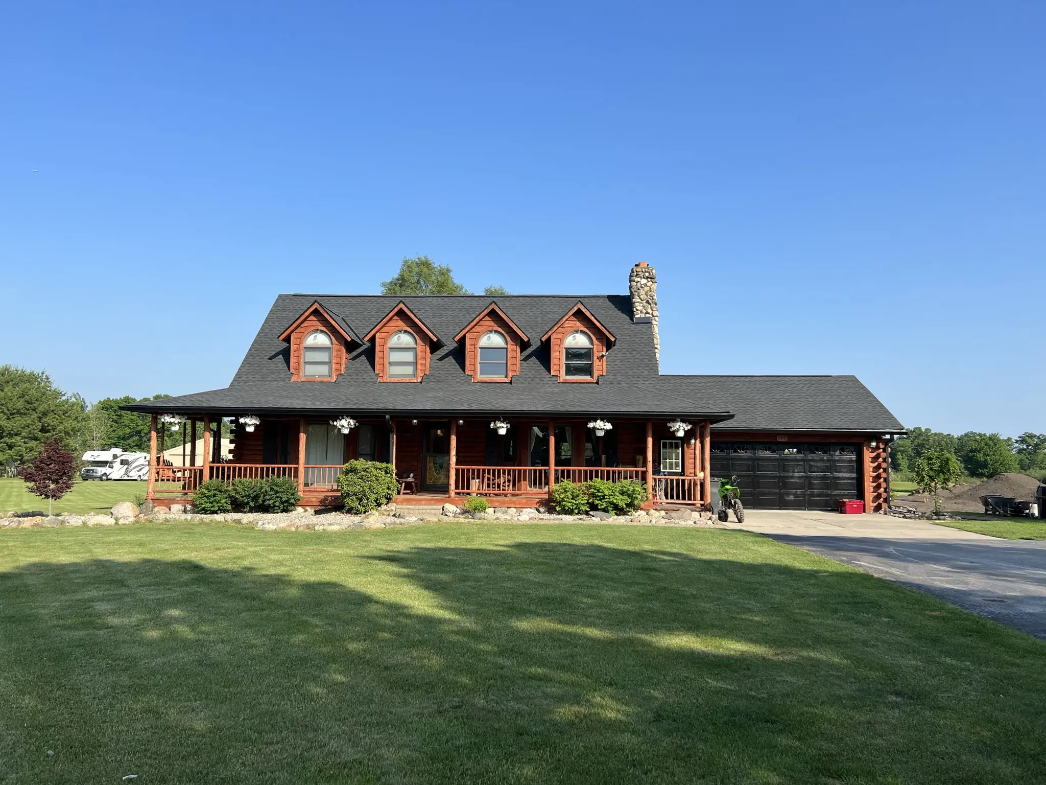 Completed asphalt shingle roof on a residential home