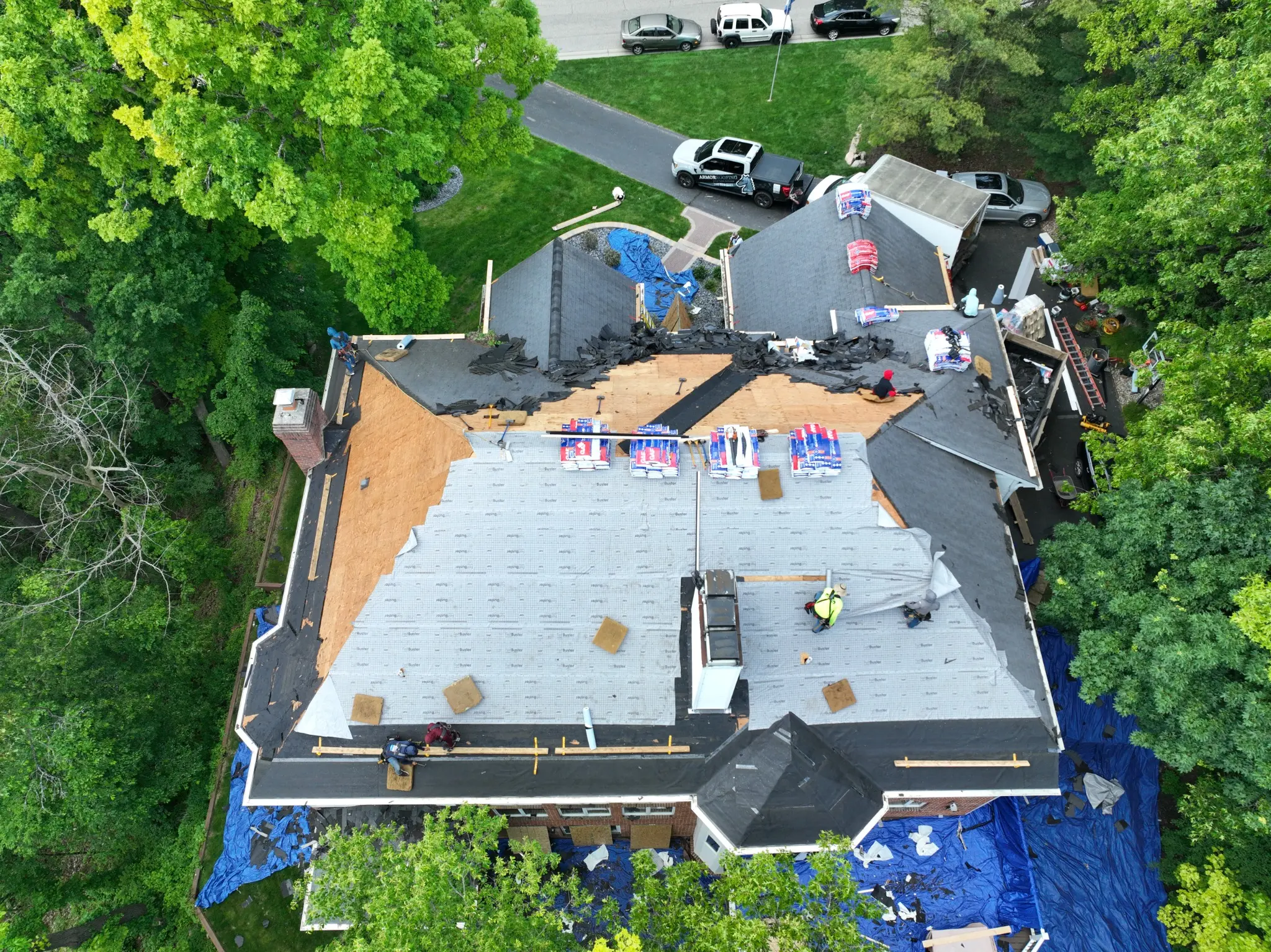 Aerial view of a complex Armor Roofing replacement project in progress