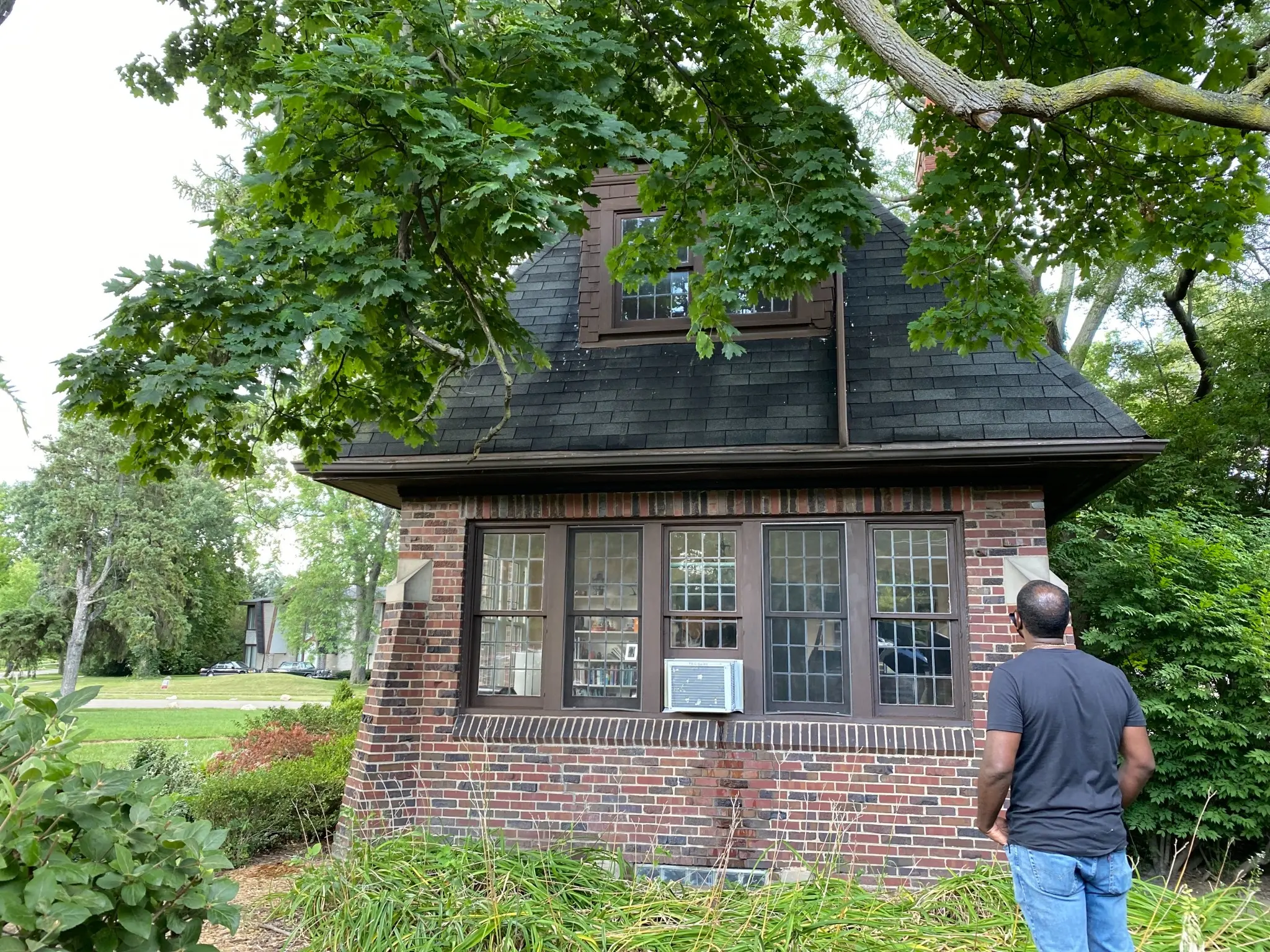 Armor Roofing inspecting an existing residential roof before recommending the appropriate scope
