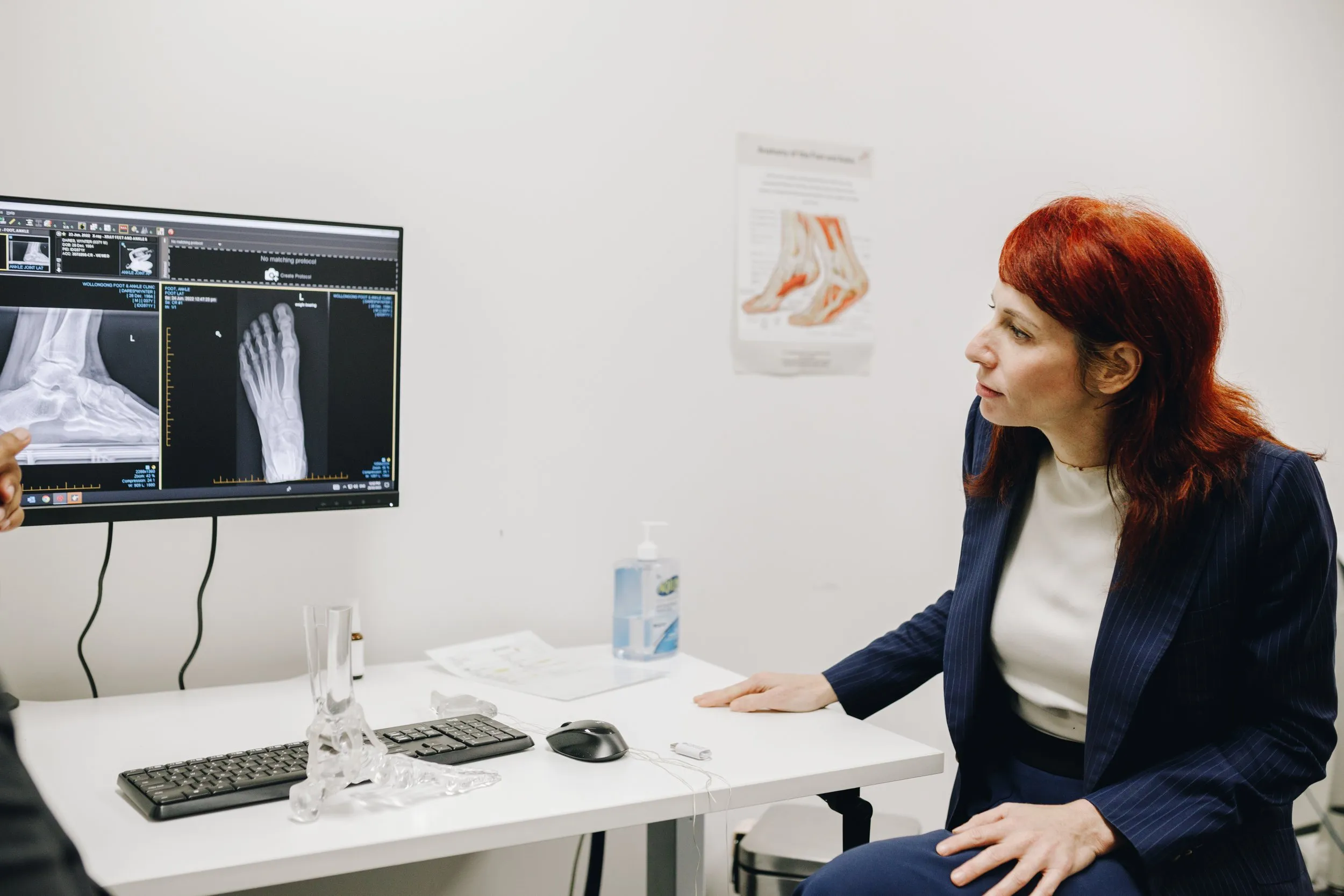 Joint Vision clinician reviewing medical imaging during an injury assessment