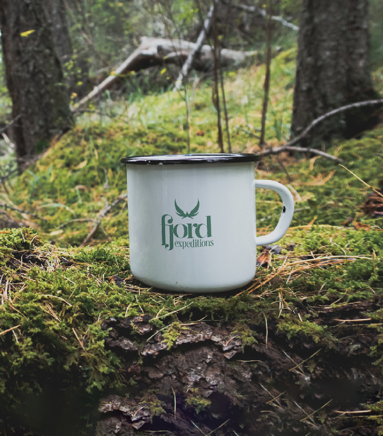 Fjord Expeditions mug with a wildlife illustration