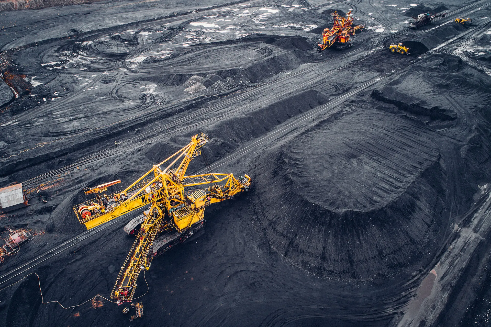 Aerial view of mining draglines at a bulk materials handling operation