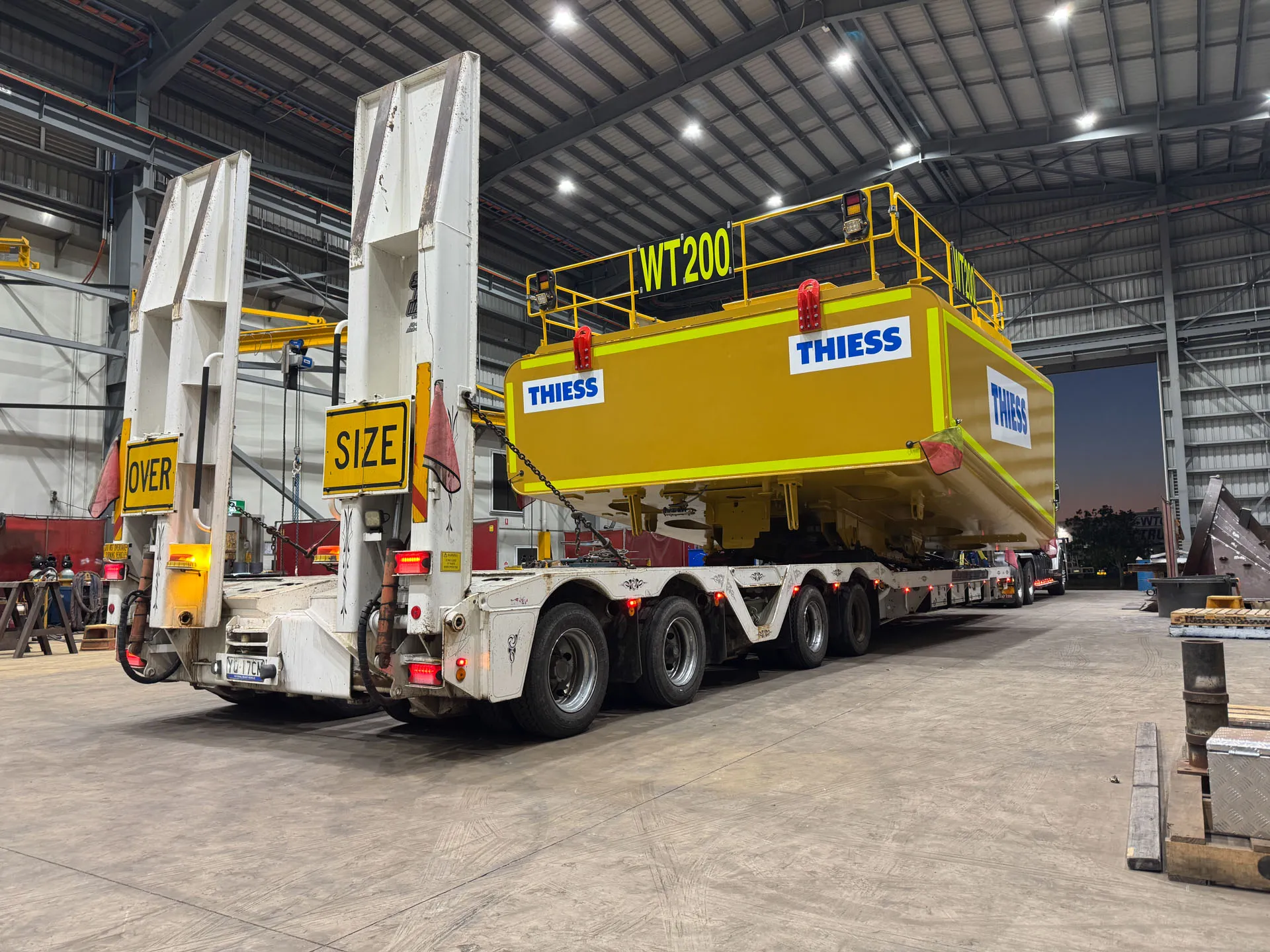 Crew repairing a mobile plant component on site