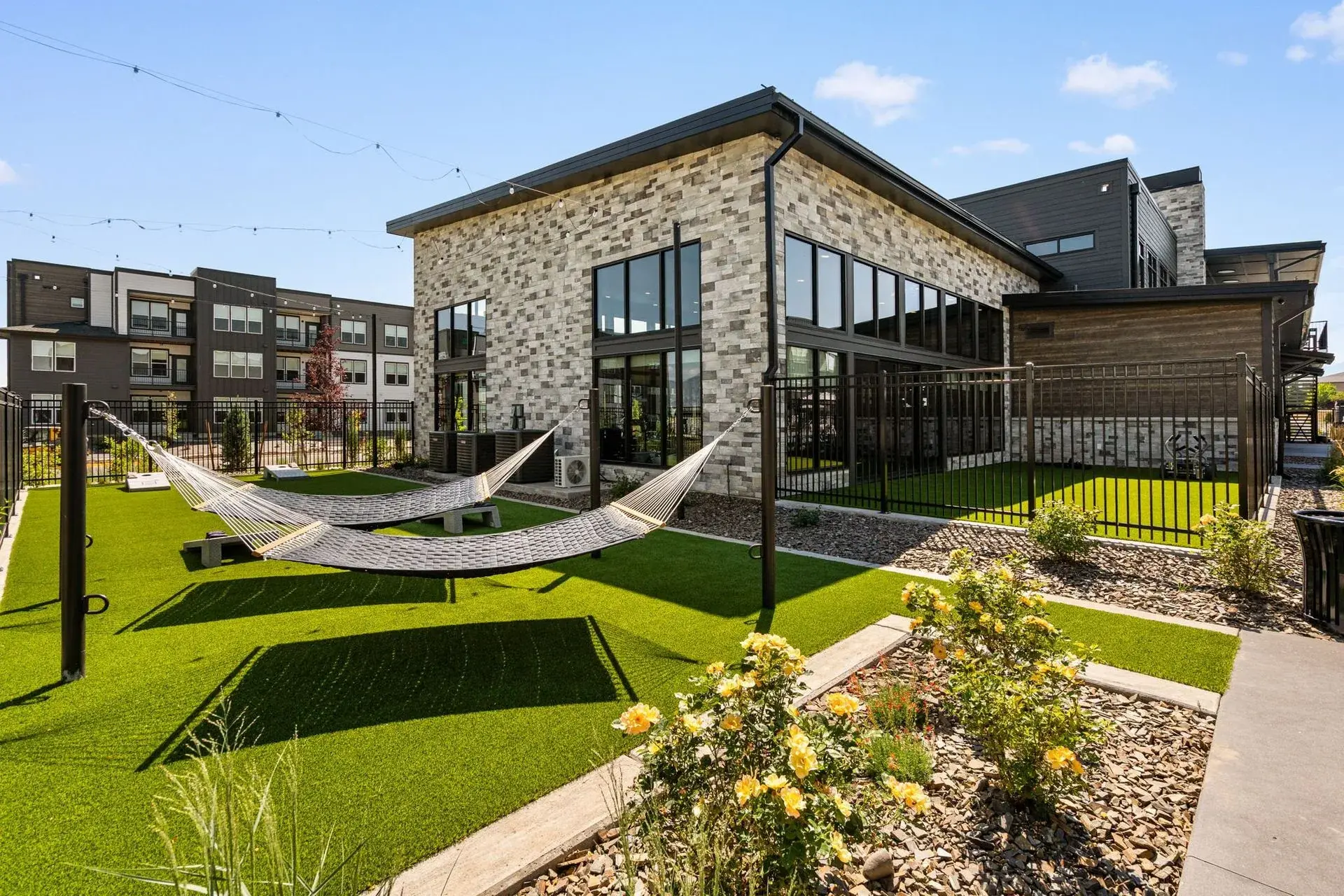 19th & Graf apartment community exterior with landscaped grounds in Bozeman, Montana