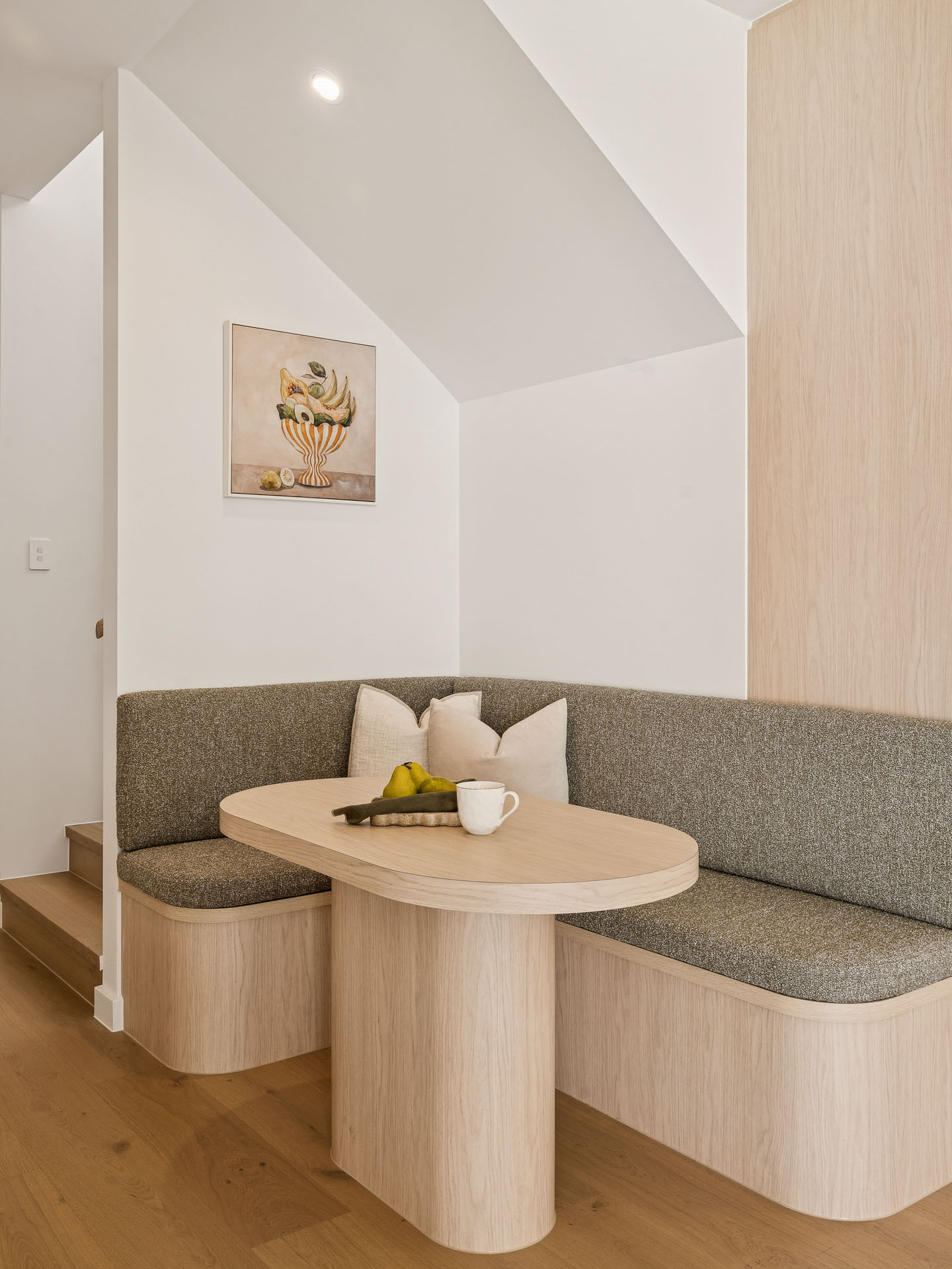 Built-in banquette beside the stair