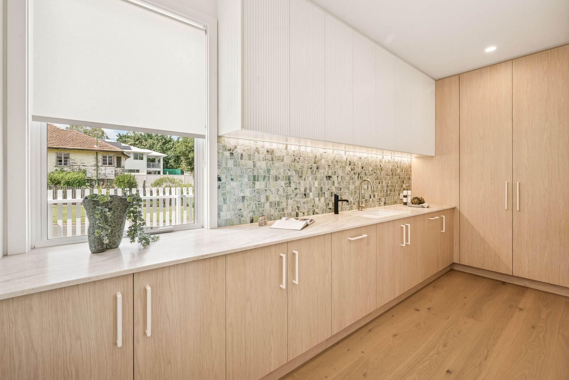 Butler’s pantry with mosaic splashback
