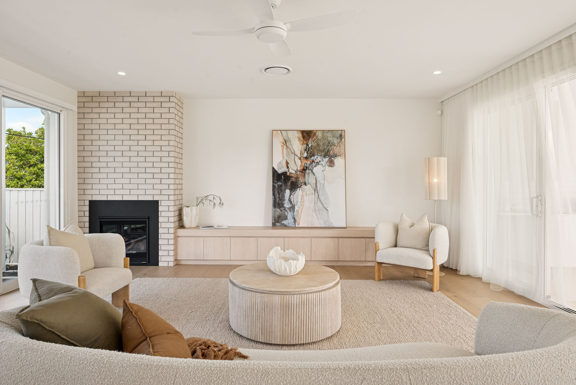 Living room and brick fireplace