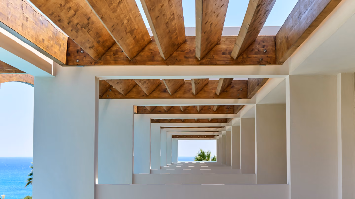 Macrocarpa beams in a covered walkway