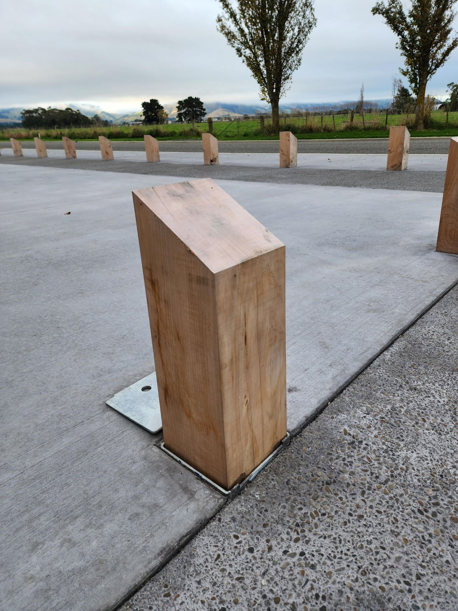 Timber bollards in a carpark