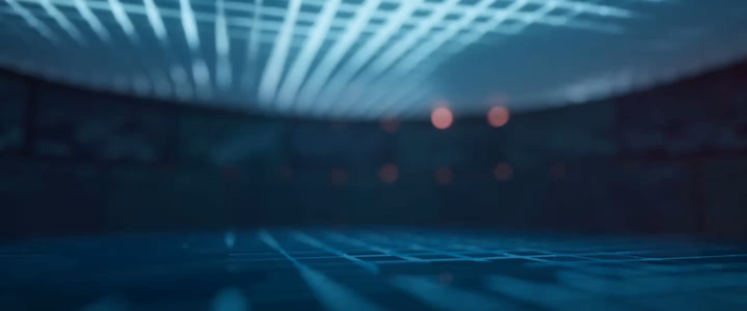 Dark industrial technology background with blurred blue lighting and the label “Safety Instrumented System TCS-900