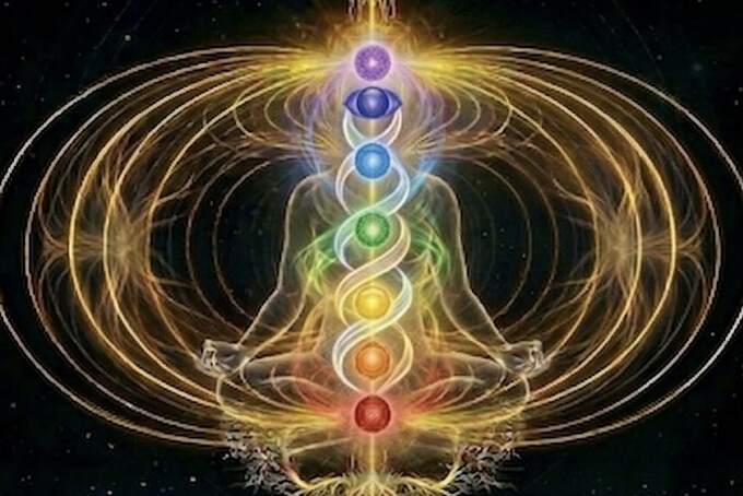 A chakra-colored DNA helix intertwined with Sanskrit symbols, visionary-art style