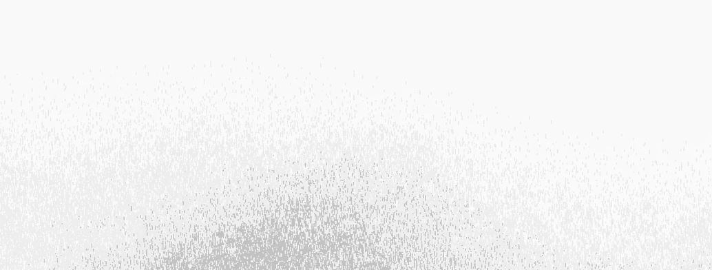 Abstract digital art with a dense concentration of small black and gray squares fading upward into a light gray background.
