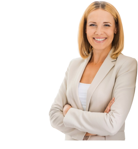 Smiling woman with blonde hair wearing a beige blazer and white top, standing with arms crossed.