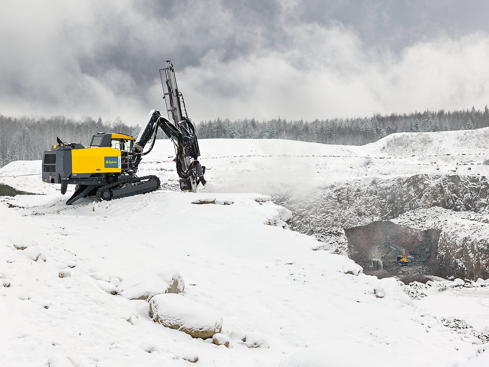 Epiroc FlexiROC T40 drilling in a quarry