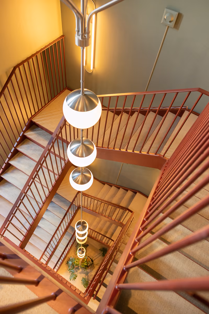 A staircase with lights in the middle