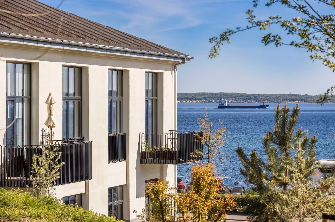 A house and the ocean in the background