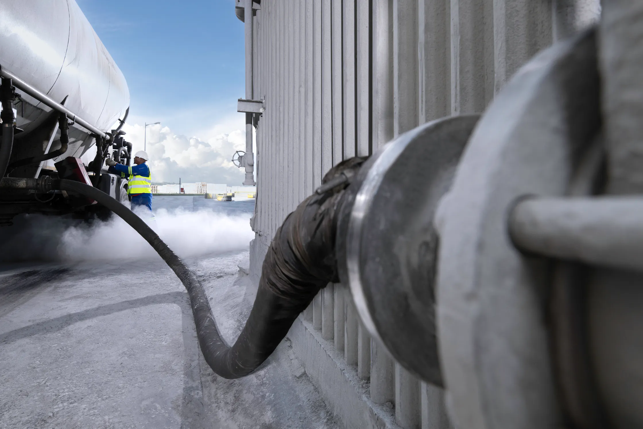 Discharge hose connected to a bulk tanker at the Kendal Ash plant