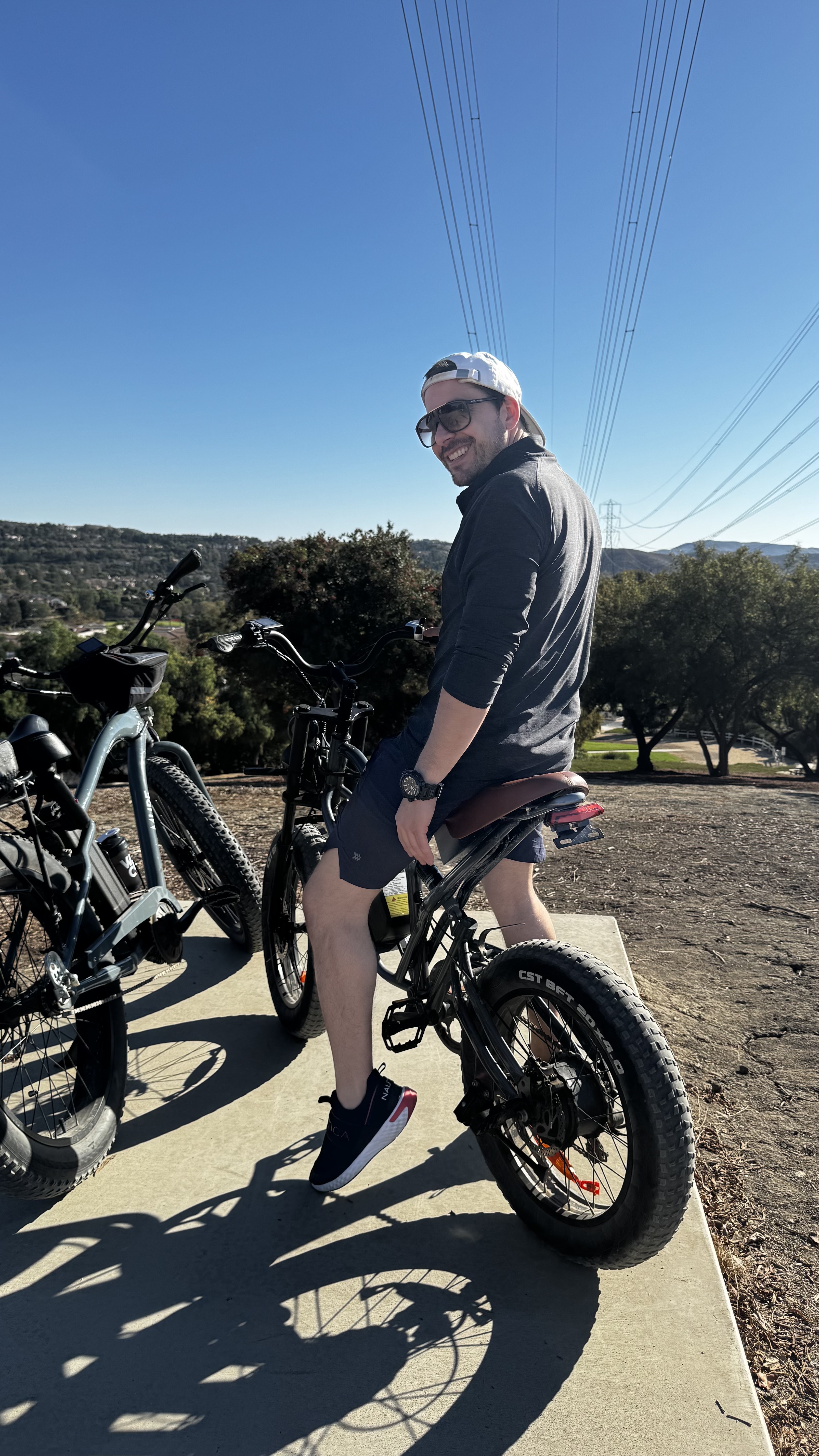 Josh Bois mountain biking on a trail
