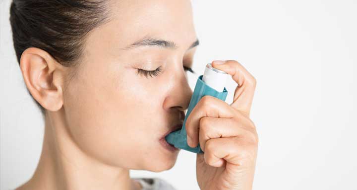 LP-asthma-woman-inhaler