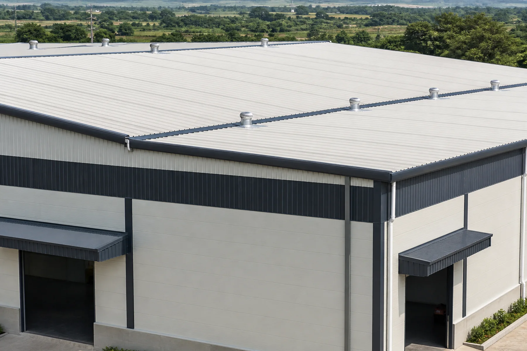 Completed insulated PUF roof and wall panel system on a modern industrial building