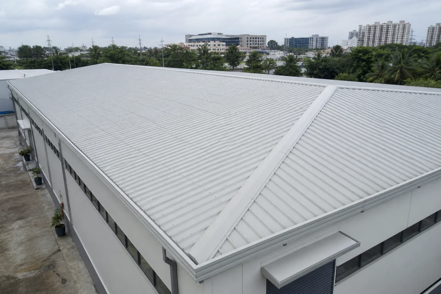 Completed uPVC industrial roofing system with coordinated flashings