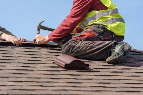Roof inspection and maintenance work on an existing building