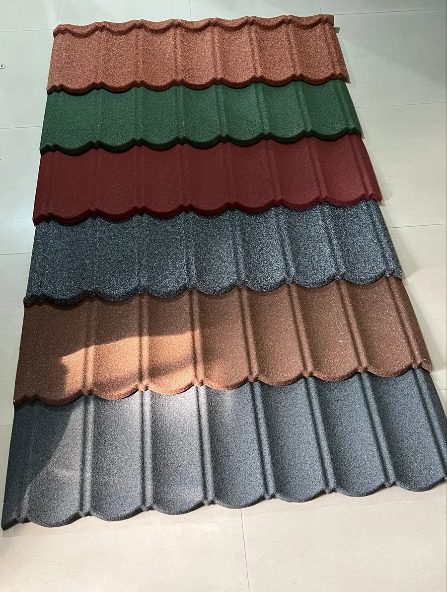 Physical samples of stone-coated metal roof tiles in brown, green, red and grey colour families