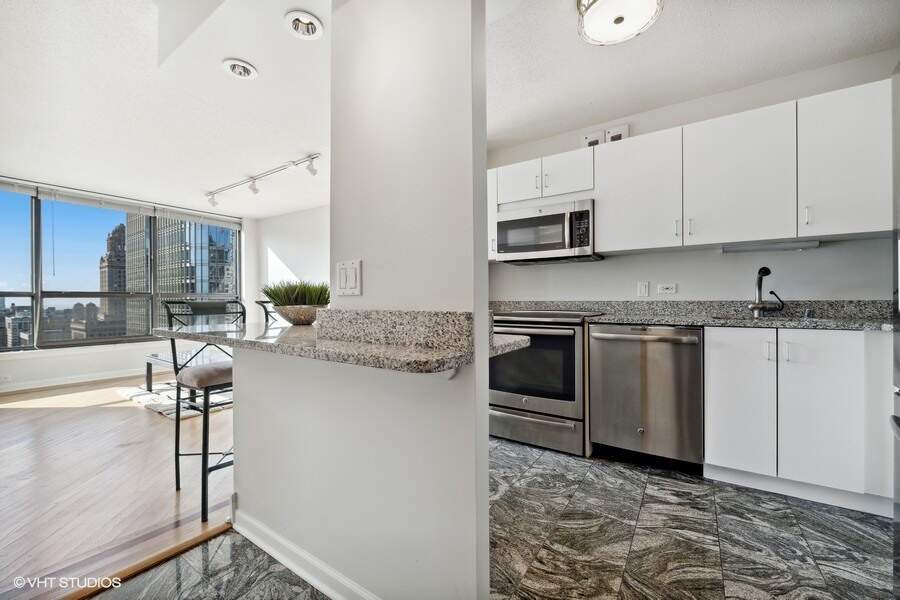 Designer kitchen and refined entertaining spaces