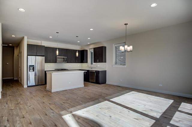 Designer kitchen and refined entertaining spaces