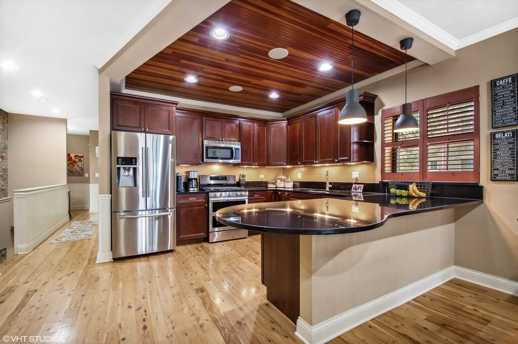 Designer kitchen and refined entertaining spaces