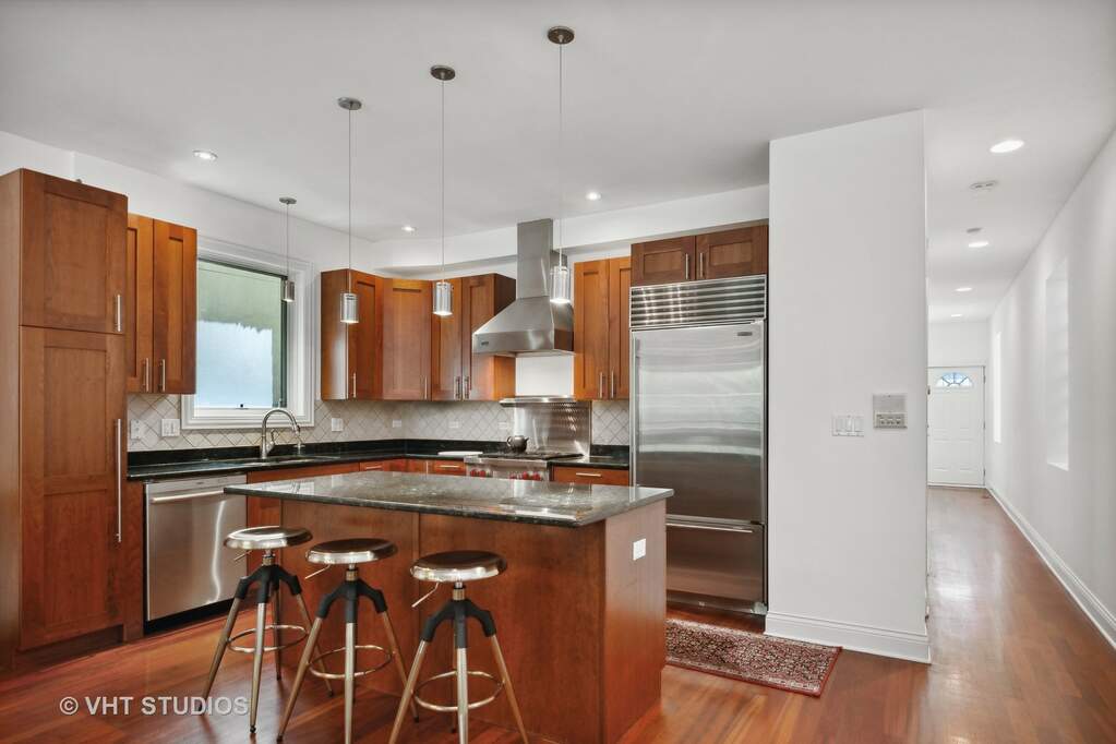 Designer kitchen and refined entertaining spaces