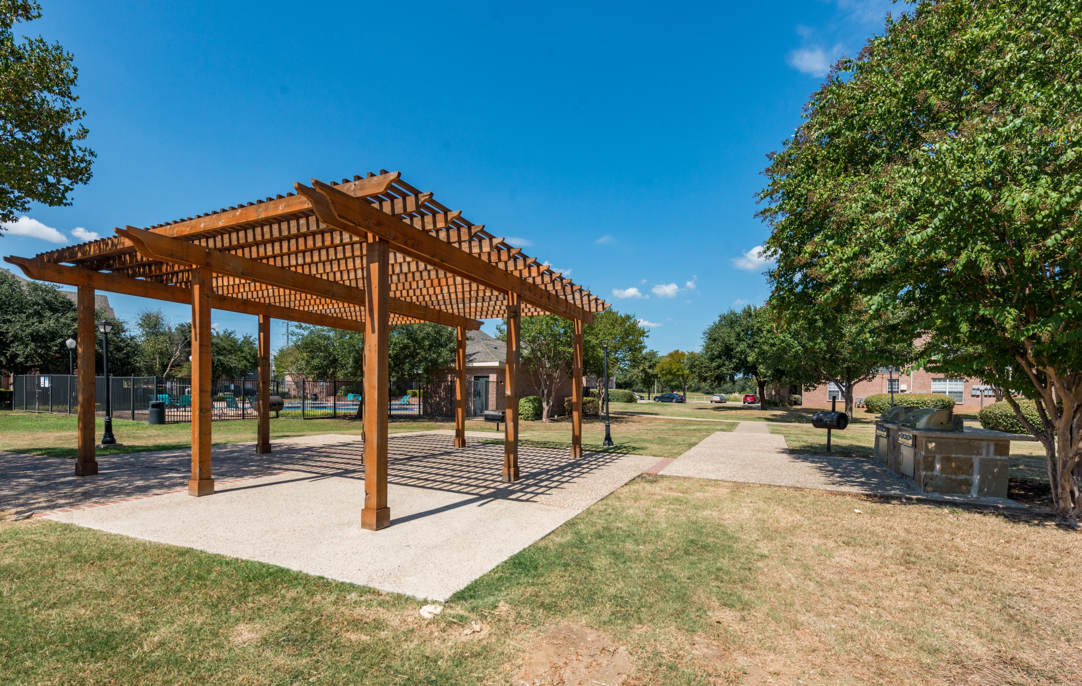 Outdoor gazebo adjacent to grilling stations
