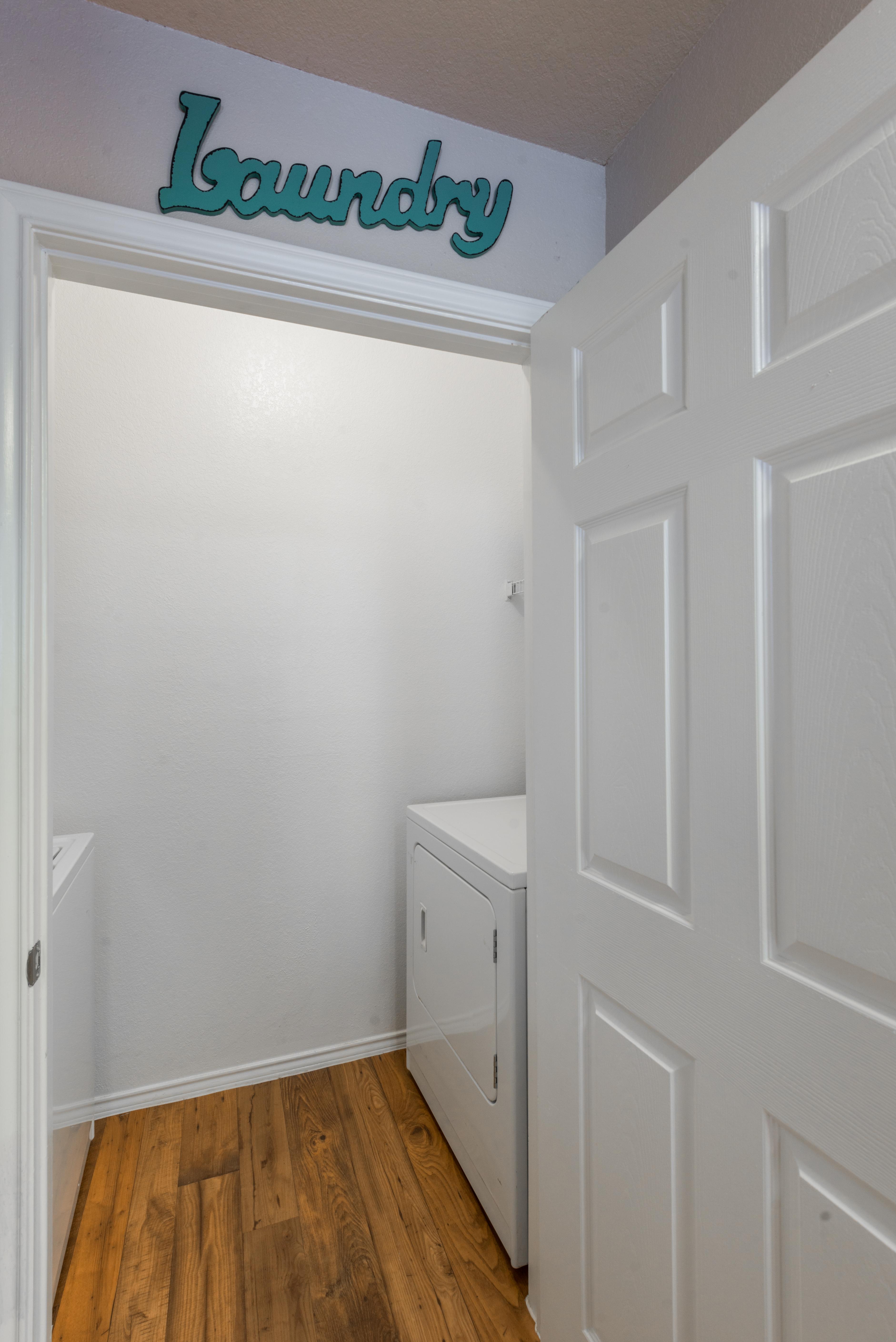 Entry to laundry room with washer and dryer