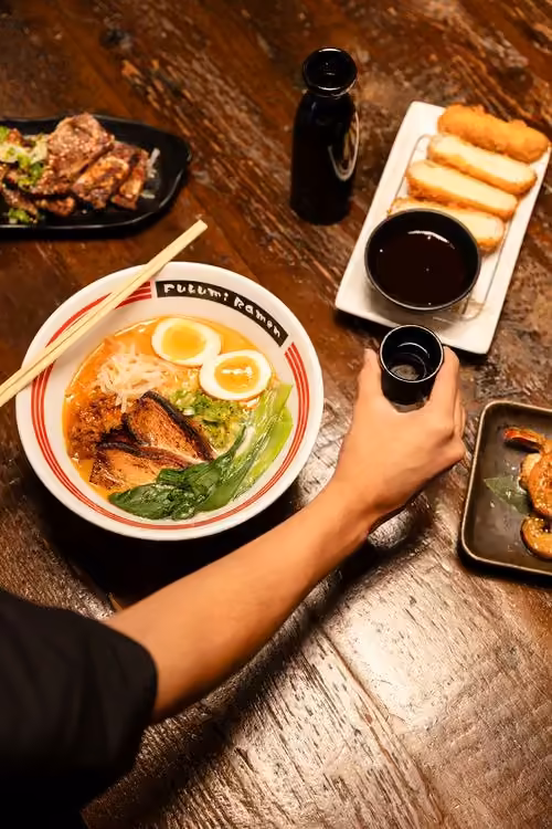 Guests sharing a meal at Fukumi