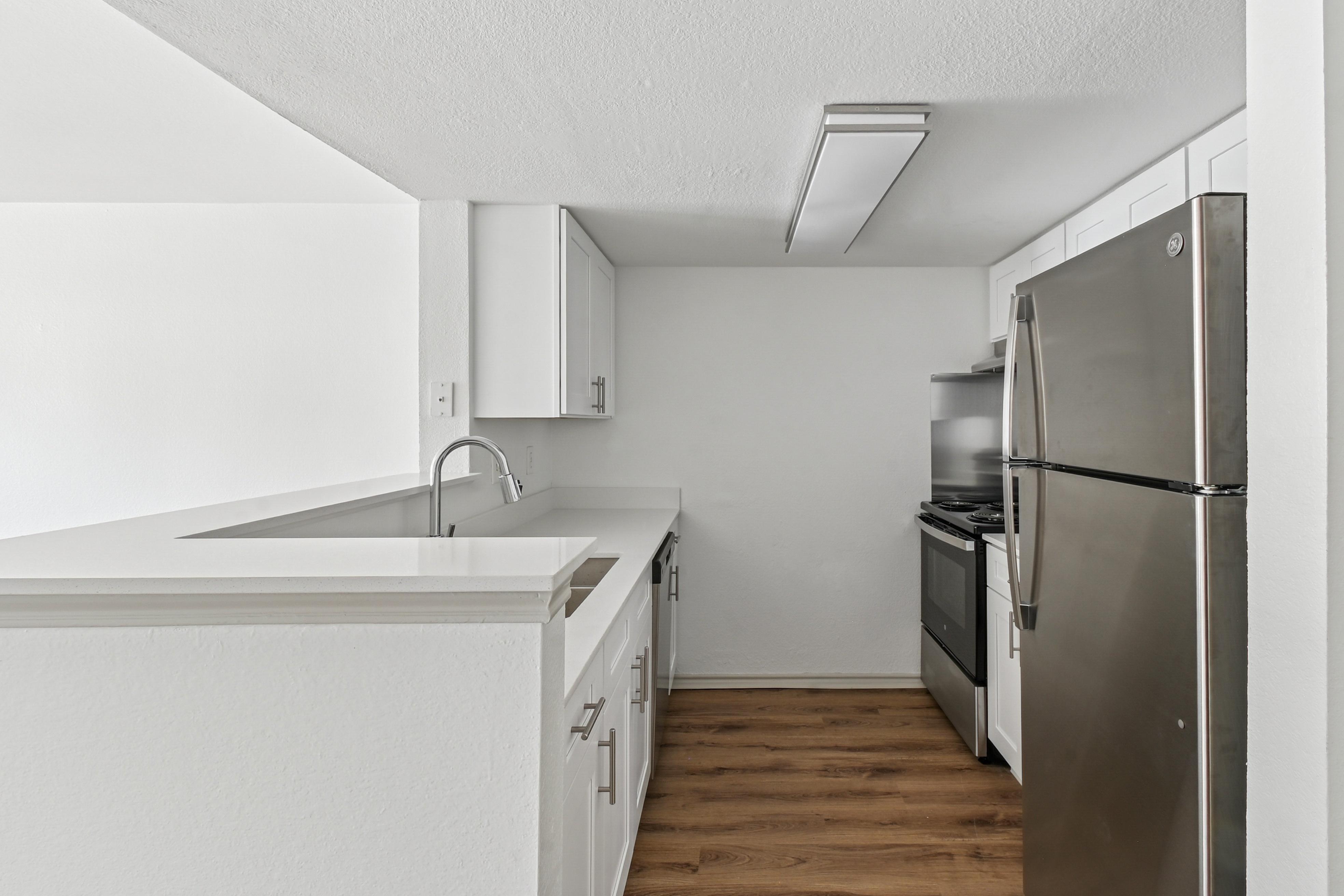 All white modern empty apartment with modern finishes