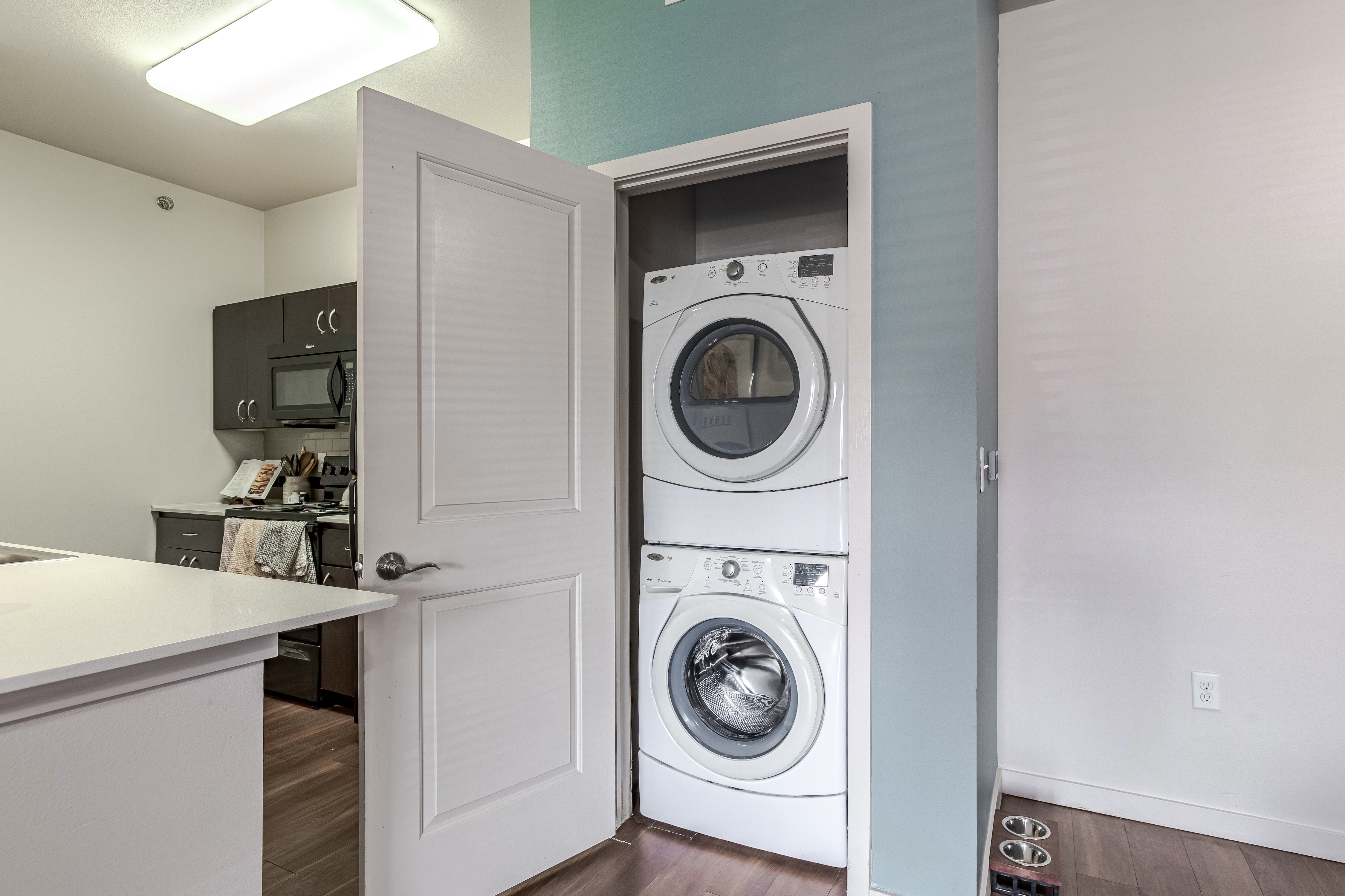 Laundry stacked in closet